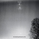 Tashi Dorji - low clouds hang, this land is on fire